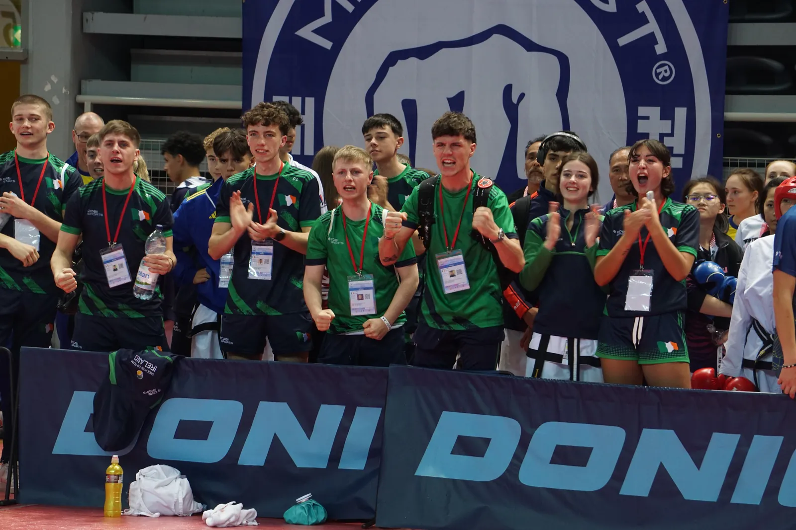 Team Ireland squad cheering from the side of the competition area