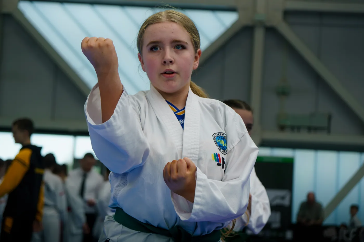 Young student holding a focused pattern position