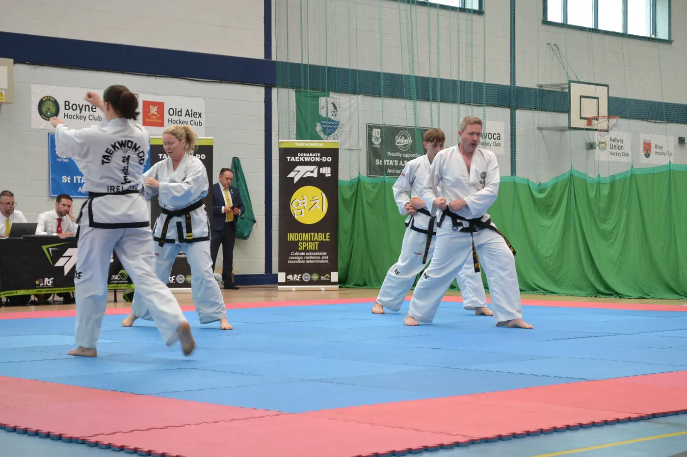 Candidates sparring during a black belt grading